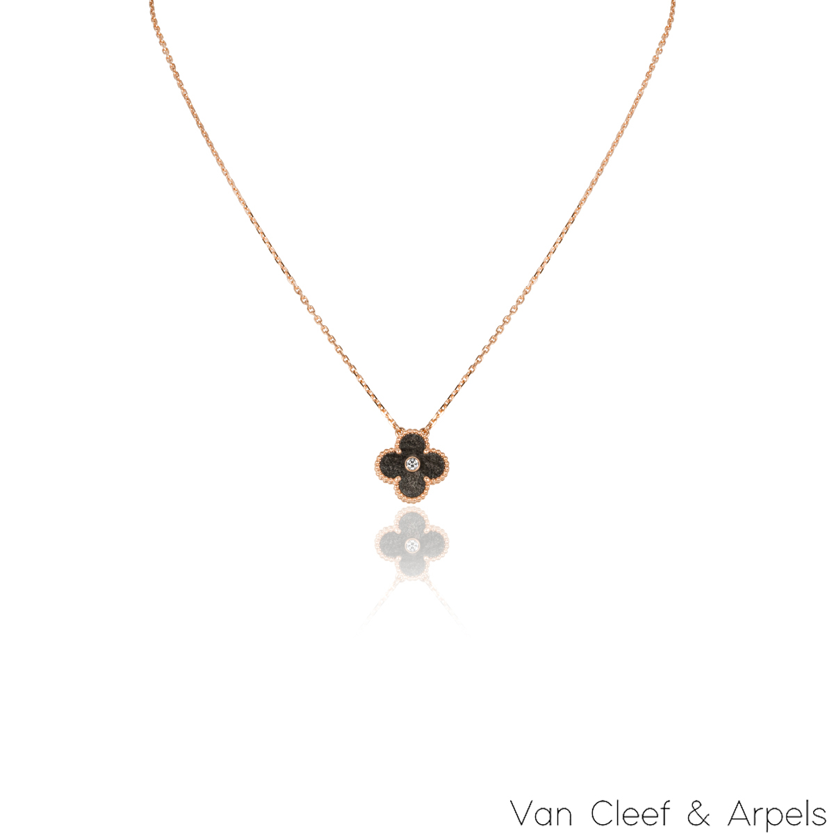 AN ICONIC RETRO GOLD, RUBY AND DIAMOND 'ZIP' NECKLACE, VAN CLEEF & ARPELS